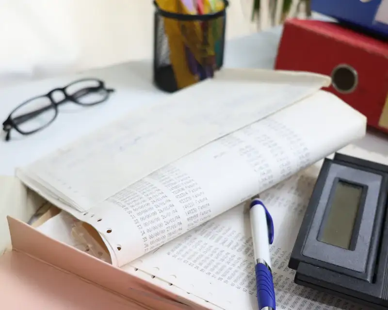 Company paperwork and files on a desk